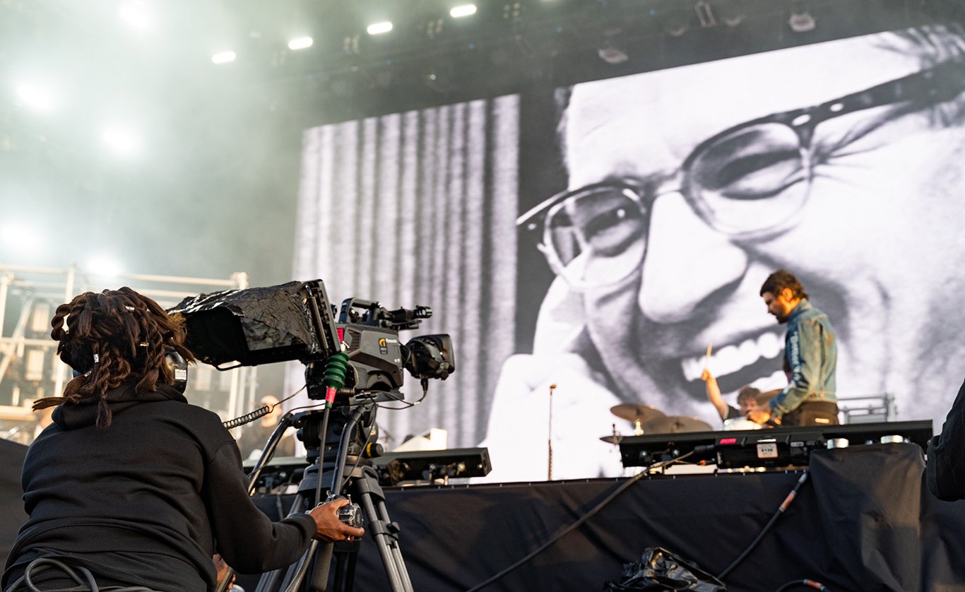 Camera operator supporting IMAG video production at a live concert